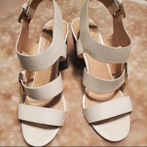 Kate Spade white sandals.